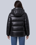 Women's High Shine Boxy Puffer Jacket with Funnel Neck and Hood in Black – Back View