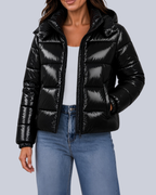 Women's Shiny Puffer Jacket with Hood and Banded Cuffs in Black – Front View