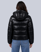 Women's Shiny Puffer Jacket with Hood and Banded Cuffs in Black – Back View