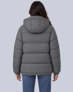 Women's Matte Bubble Puffer Jacket with Hood and Toggle Hem in Grey – Back View
