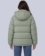 Women's Matte Bubble Puffer Jacket with Hood and Toggle Hem in Light Green – Back View