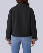 Women's Short Boxy Trench Jacket with Shirt Collar and Turn Up Check Cuffs in Black – Back View